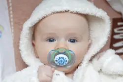 child with pacifier